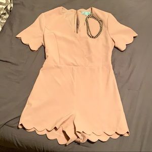 Scalloped light pink romper